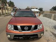 Nissan Frontier King Cab SE V6 2011 Brown for sale