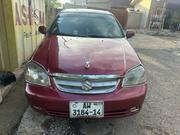 Suzuki Forenza 2010 Red for sale