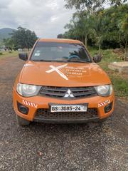 Mitsubishi L200 2010 Orange for sale