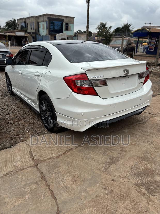 Honda Civic EX-L 4dr Sedan w/Nav (1.8L 4cyl CVT) 2014 White