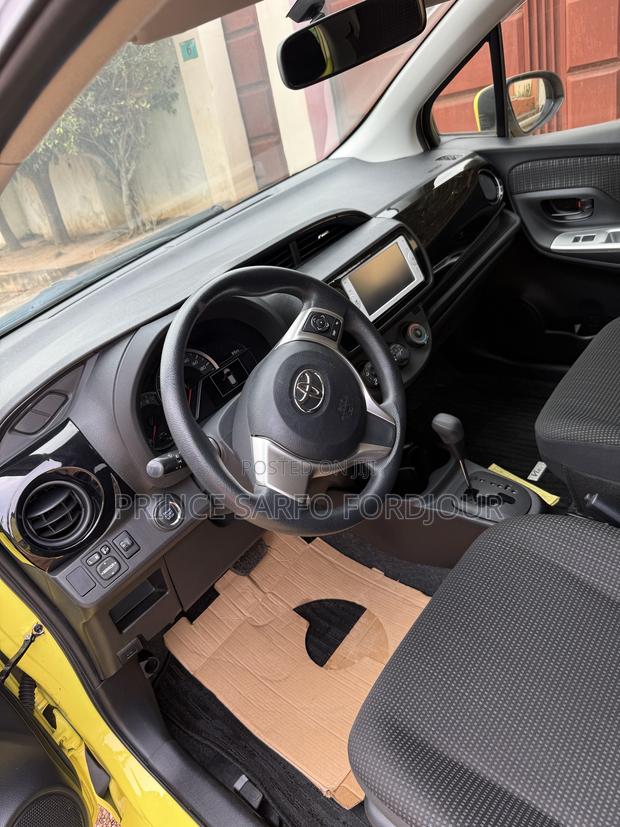 Toyota Vitz 2015 Yellow