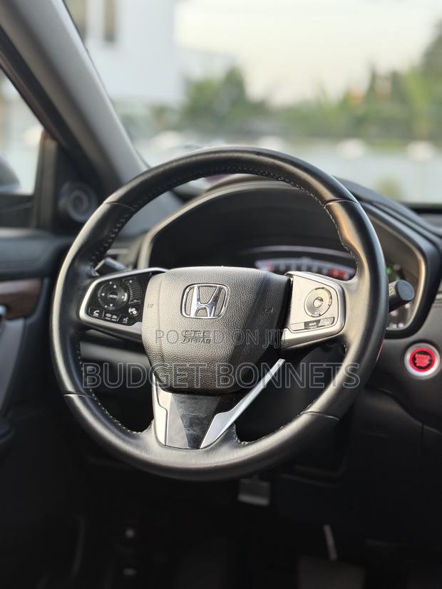 Honda CR-V Touring 4dr SUV AWD (1.5L 4cyl CVT) 2017 Burgundy