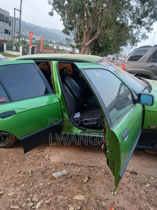 BMW 3 Series 318i RWD 1999 Green
