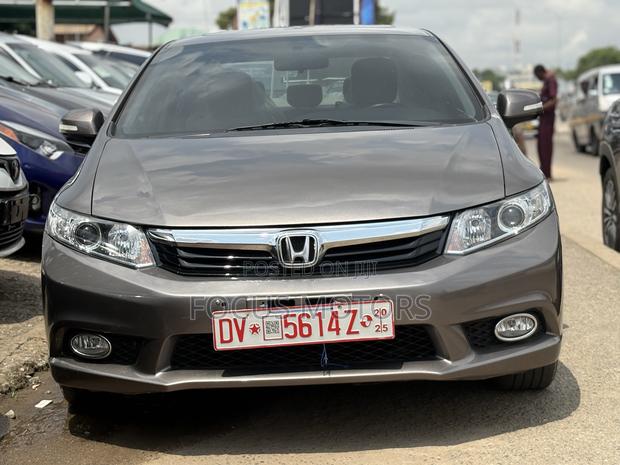 Honda Civic EX-L 2dr Coupe (1.8L 4cyl CVT) 2014 Gold