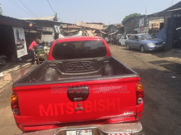 Mitsubishi L200 Double Cab 2.5 136hp 4WD 2013 Red