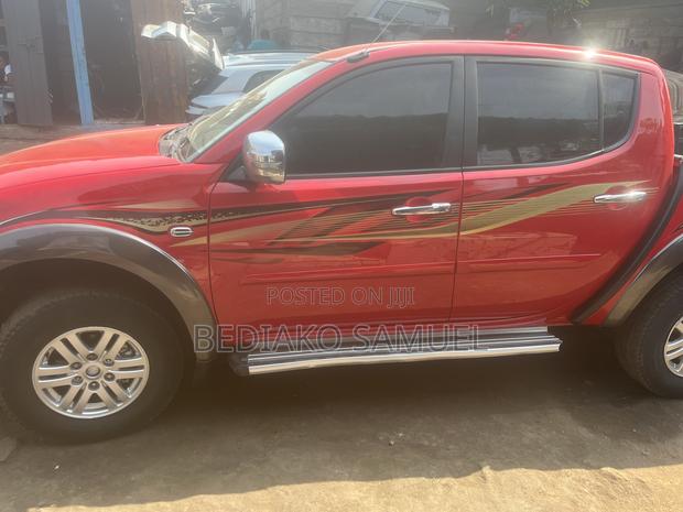Mitsubishi L200 Double Cab 2.5 136hp 4WD 2013 Red