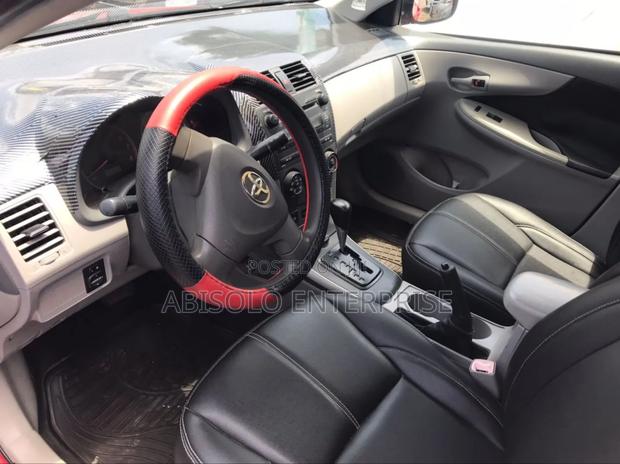 Toyota Corolla LE 4dr Sedan (1.8L 4cyl 4A) 2010 Red