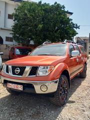 Nissan Frontier 2011 Orange for sale