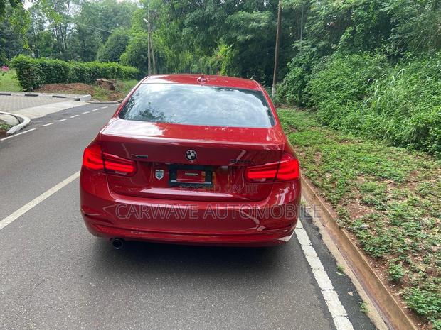 BMW 320i Sedan RWD 2017 Red