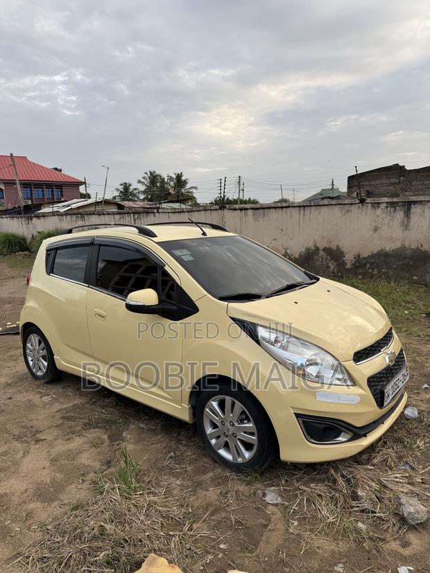 Chevrolet Spark 1LT 4dr Hatchback (1.2L 4cyl CVT) 2014 Yellow