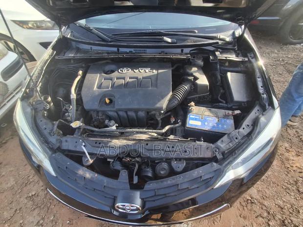 Toyota Corolla L 4dr Sedan (1.8L 4cyl 6M) 2015 Black