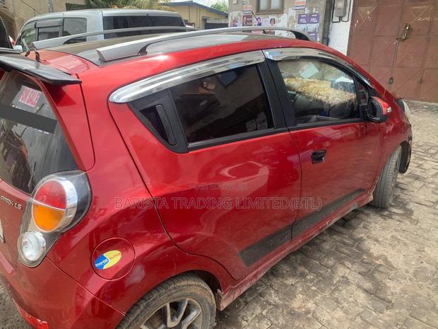 Chevrolet Spark 2LT 4dr Hatchback (1.2L 4cyl CVT) 2014 Red