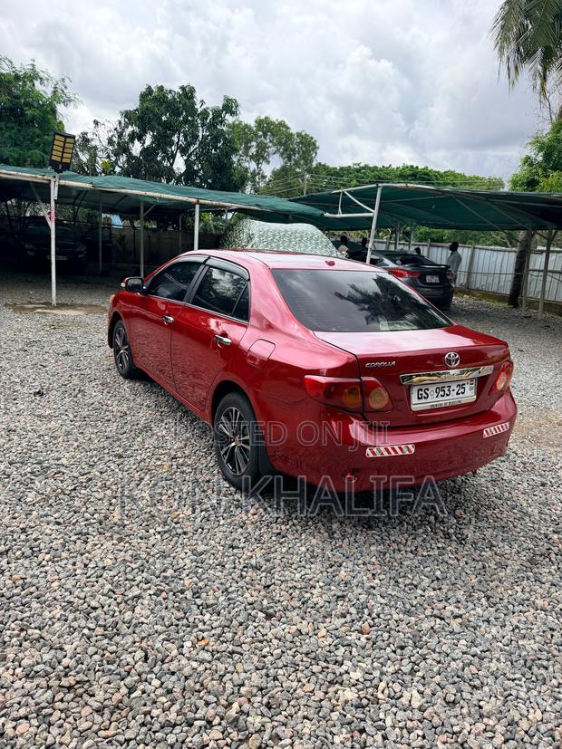 Toyota Corolla Base 4dr Sedan (1.8L 4cyl 5M) 2010 Red