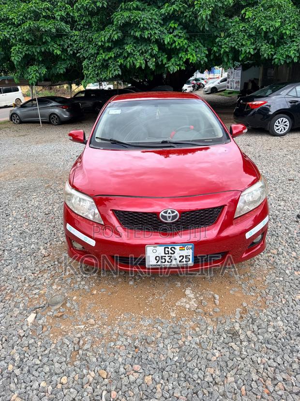 Toyota Corolla Base 4dr Sedan (1.8L 4cyl 5M) 2010 Red