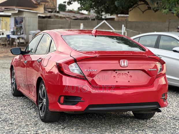 Honda Civic Touring 2dr Coupe (1.5L 4cyl) 2016 Red