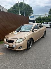 Toyota Corolla Base 4dr Sedan (1.8L 4cyl 5M) 2010 Brown for sale