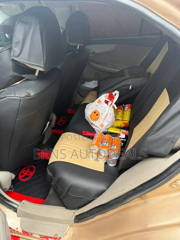 Toyota Corolla Base 4dr Sedan (1.8L 4cyl 5M) 2010 Brown