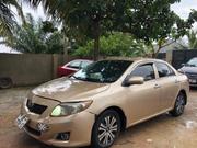 Toyota Corolla Base 4dr Sedan (1.8L 4cyl 5M) 2010 Brown for sale