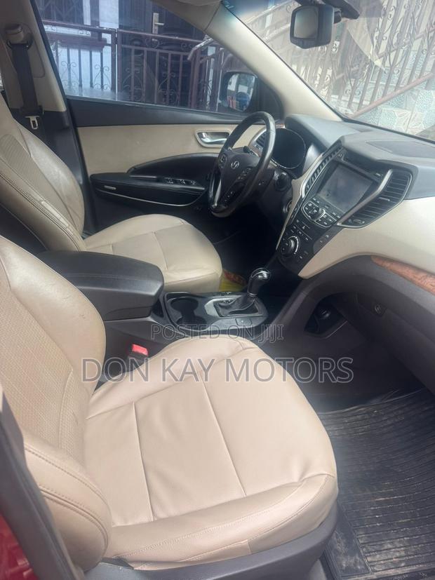 Hyundai Santa Fe Limited 4dr SUV AWD (3.3L 6cyl 6A) 2015 Red