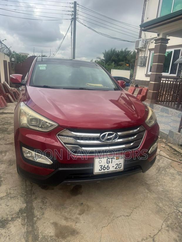 Hyundai Santa Fe Limited 4dr SUV AWD (3.3L 6cyl 6A) 2015 Red
