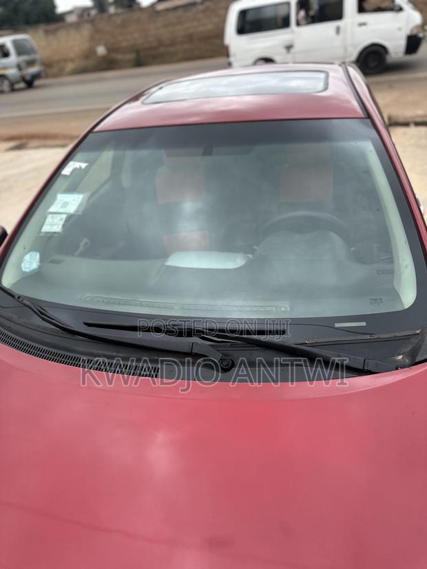 Toyota Corolla Base 4dr Sedan (1.8L 4cyl 5M) 2010 Red