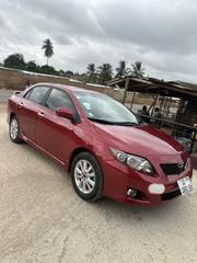Toyota Corolla Base 4dr Sedan (1.8L 4cyl 5M) 2010 Red for sale