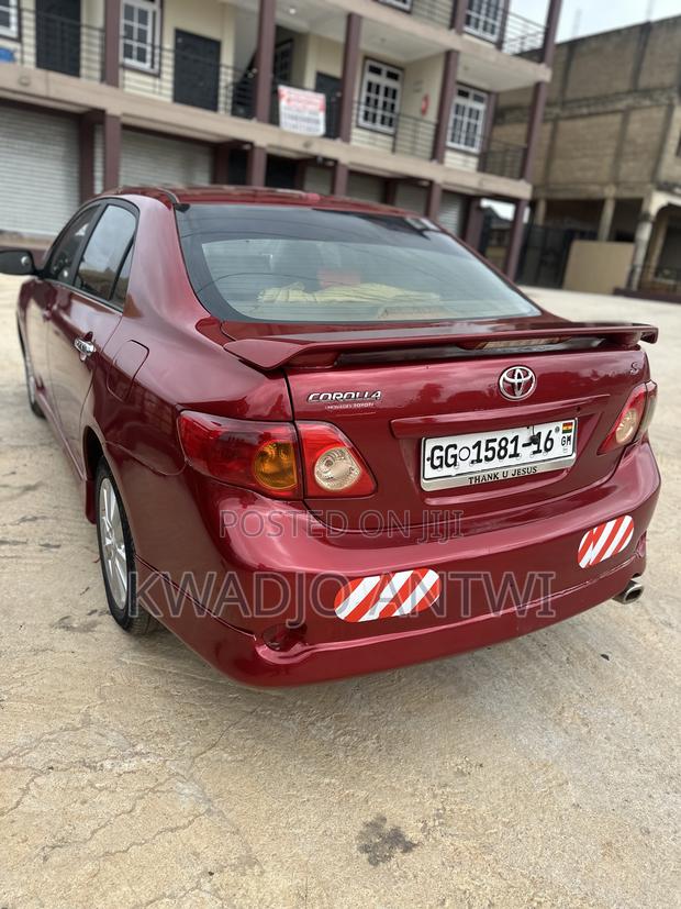 Toyota Corolla Base 4dr Sedan (1.8L 4cyl 5M) 2010 Red