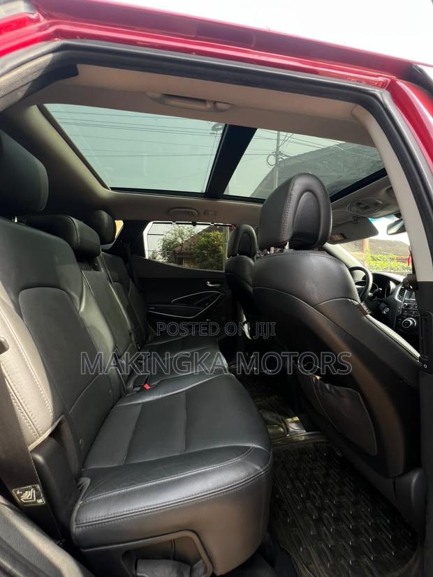 Hyundai Santa Fe Limited 4dr SUV AWD (3.3L 6cyl 6A) 2015 Red