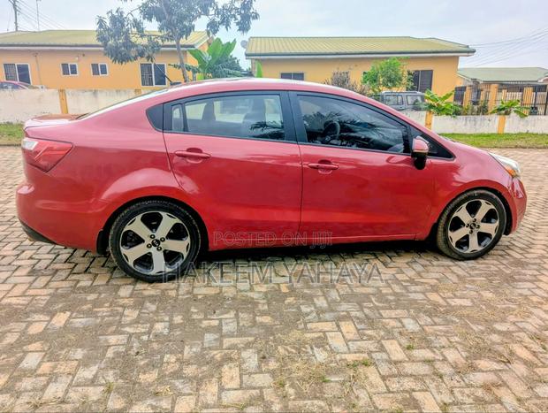 Kia Rio SX 4dr Sedan (1.6L 4cyl 6A) 2015 Burgundy