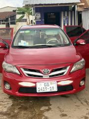 Toyota Corolla Base 4dr Sedan (1.8L 4cyl 5M) 2011 Red for sale