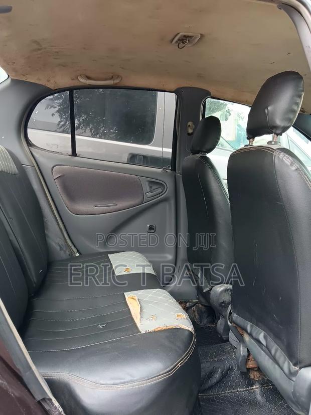 Toyota Echo 2011 Beige