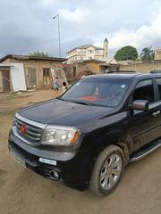Honda Pilot Touring w/RES/Navi 4WD (3.5L 6cyl 5A) 2013 Burgundy for sale