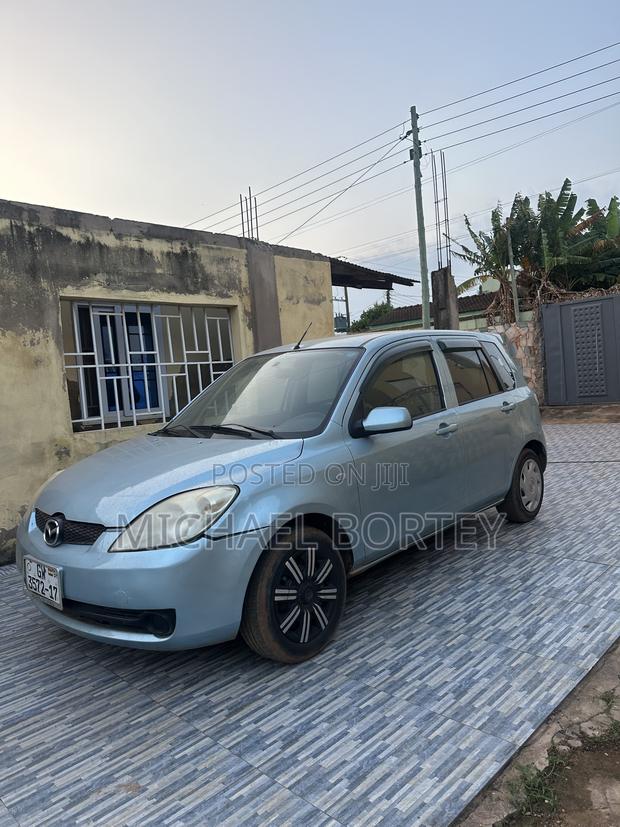 Mazda Demio 2009 Blue