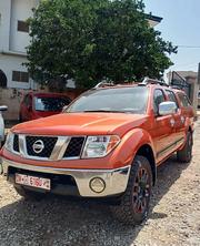 Nissan Frontier 2011 Orange for sale