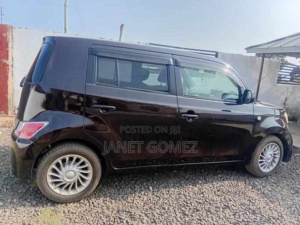 Daihatsu Cuore 2006 Brown