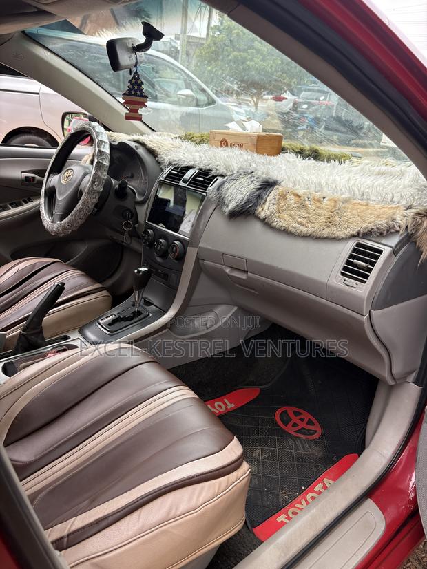 Toyota Corolla Base 4dr Sedan (1.8L 4cyl 5M) 2010 Red