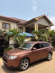 Mitsubishi Outlander SE 4dr SUV AWD (2.4L 4cyl CVT) 2014 Brown for sale