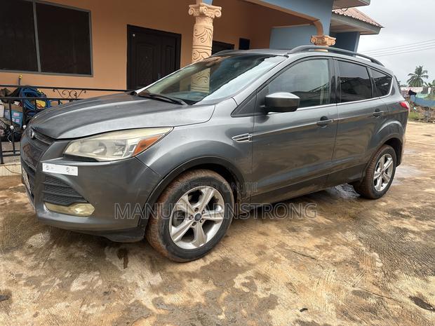 Ford Escape Titanium 4dr SUV (1.6L 4cyl Turbo 6A) 2014 Red