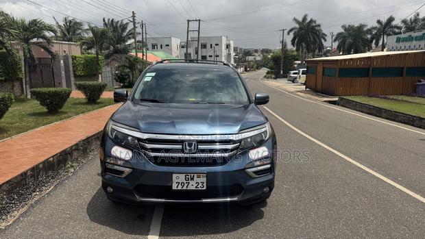 Honda Pilot Touring 4dr SUV 4WD (3.5L 6cyl 9A) 2017 Blue