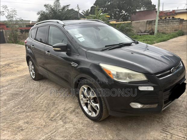 Ford Escape Titanium 4dr SUV AWD  (1.6L 4cyl Turbo 6A) 2014 Beige