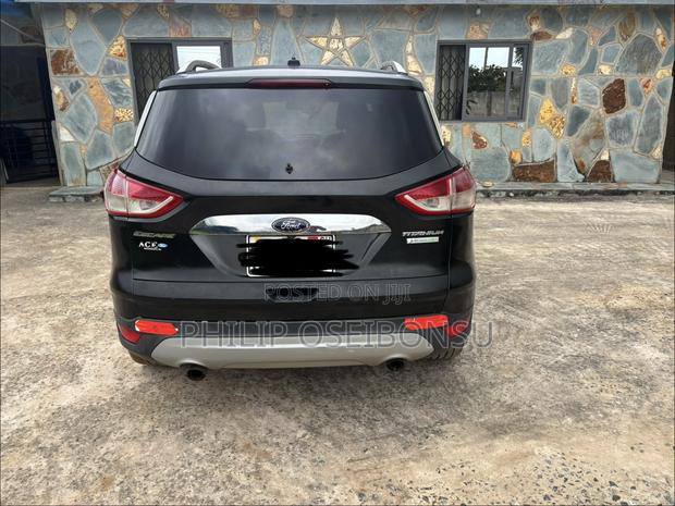 Ford Escape Titanium 4dr SUV AWD  (1.6L 4cyl Turbo 6A) 2014 Beige