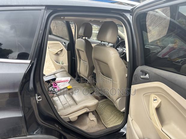 Ford Escape Titanium 4dr SUV AWD  (1.6L 4cyl Turbo 6A) 2014 Beige