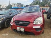 Kia Rondo 2009 Burgundy for sale