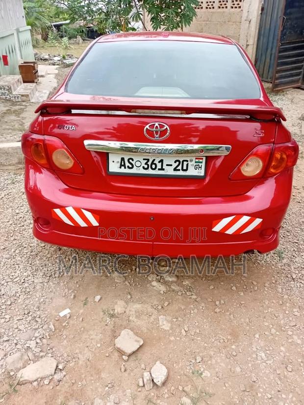 Toyota Corolla Base 4dr Sedan (1.8L 4cyl 5M) 2010 Red
