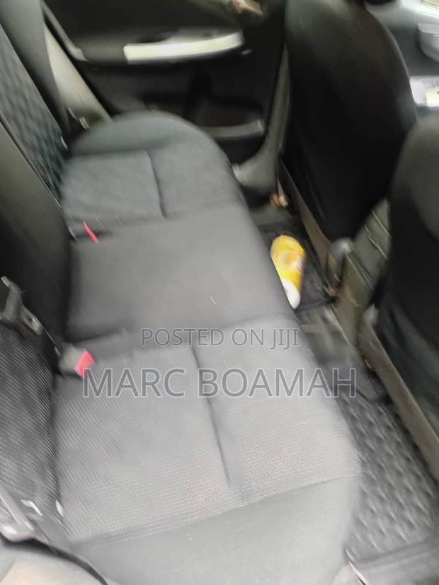 Toyota Corolla Base 4dr Sedan (1.8L 4cyl 5M) 2010 Red