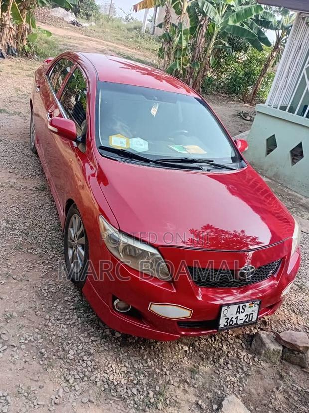 Toyota Corolla Base 4dr Sedan (1.8L 4cyl 5M) 2010 Red
