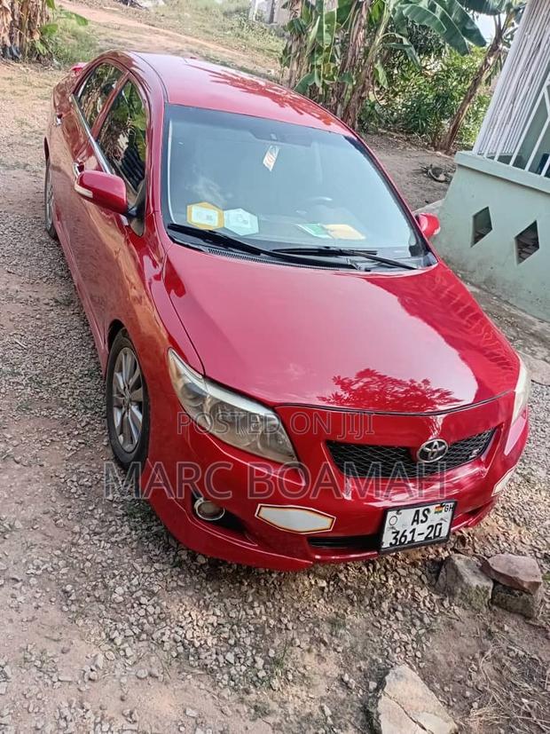 Toyota Corolla Base 4dr Sedan (1.8L 4cyl 5M) 2010 Red