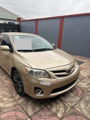 Toyota Corolla LE 4dr Sedan (1.8L 4cyl 4A) 2013 Gold for sale