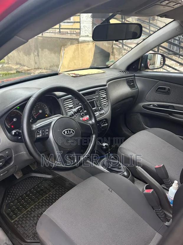 Kia Rio SX 4dr Sedan (1.6L 4cyl 4A) 2010 Red