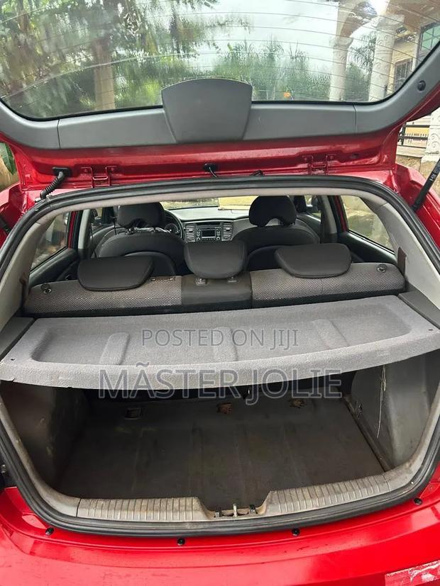 Kia Rio SX 4dr Sedan (1.6L 4cyl 4A) 2010 Red